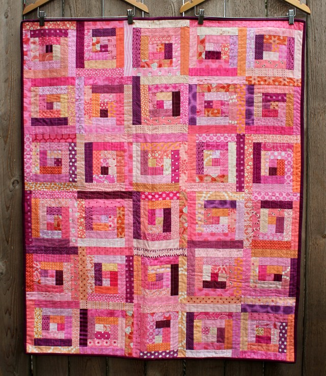 scrap log cabin quilt