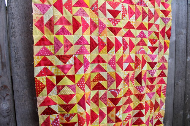 modern flying geese scrap quilt