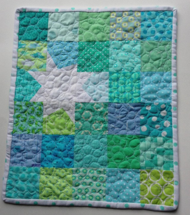 aqua wonky star doll quilt