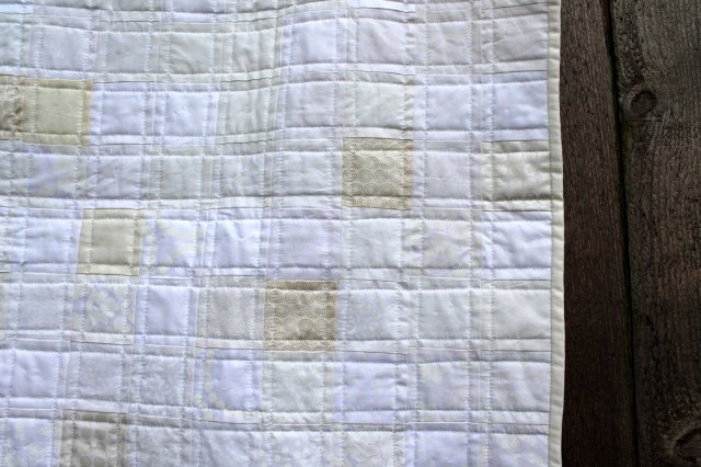 white quilt detail