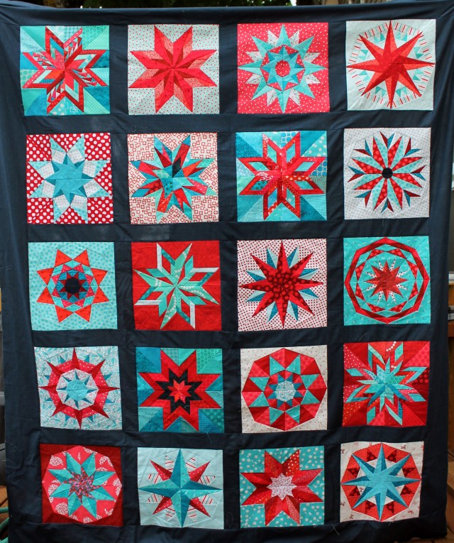paper pieced star quilt top