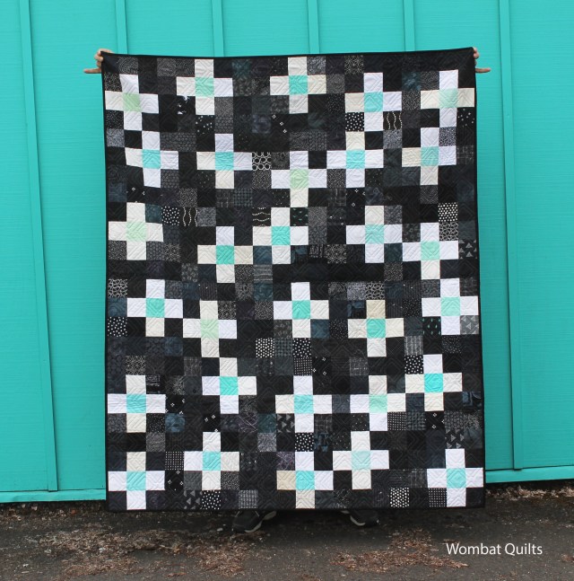 finished aqua cross quilt